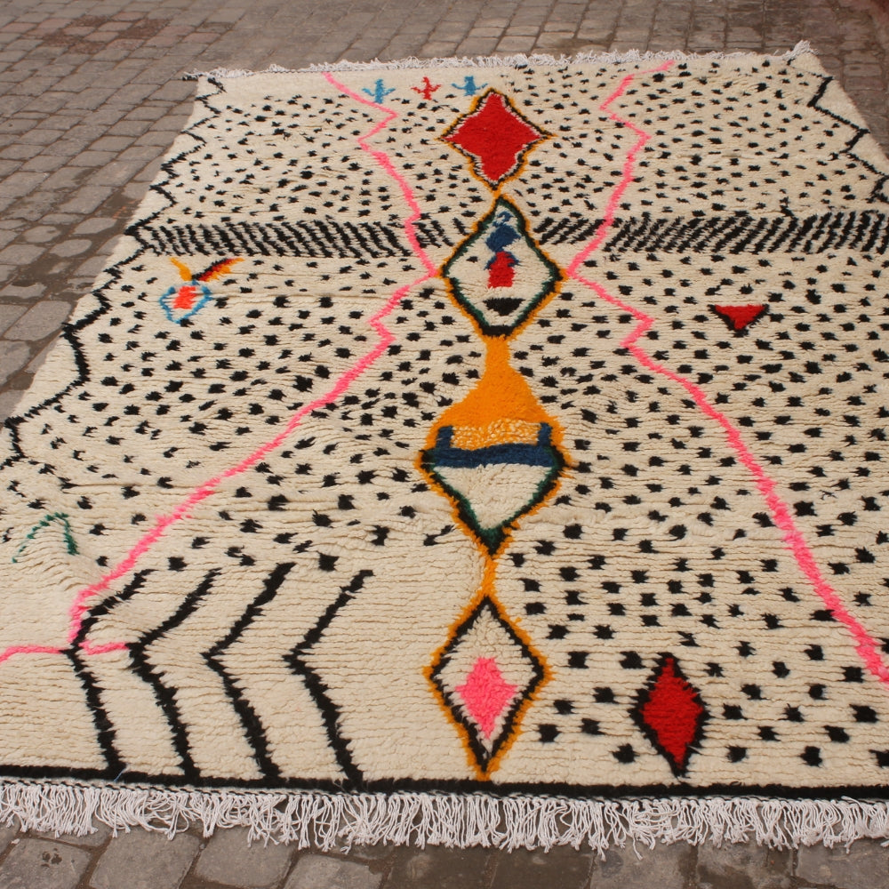 Traditional Moroccan rug with artistic tribal design