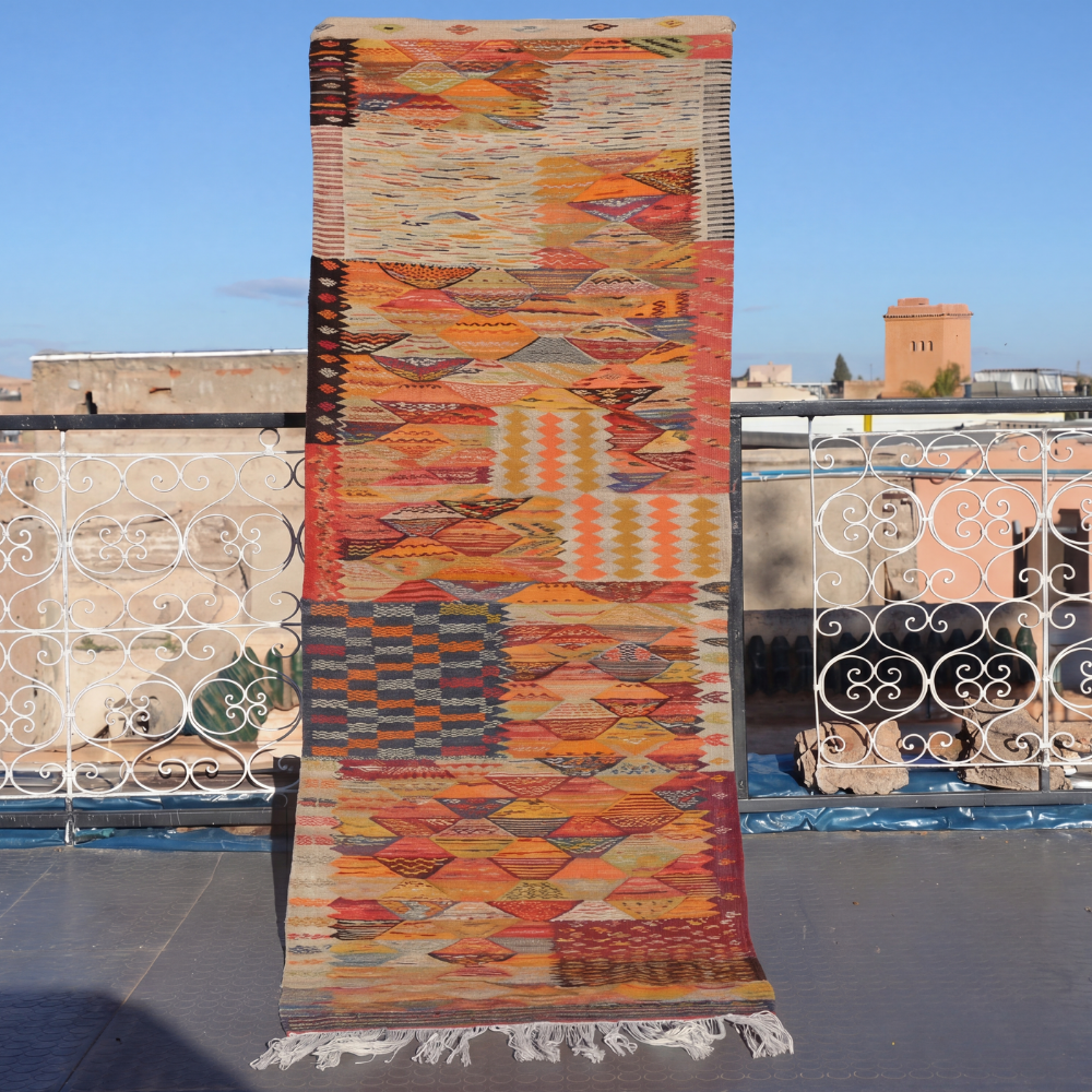 Berber Picasso Taznakht rug with colorful geometric motifs handwoven in Moroccan flatweave wool