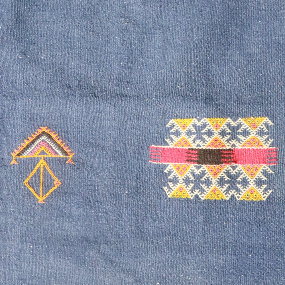 embroidered motifs of an Aknif flatweave rug handwoven