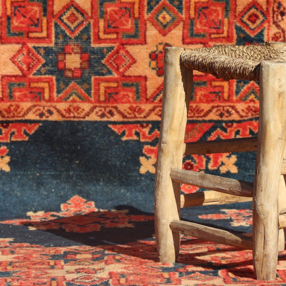 Moroccan vintage wool rug from Taznakht region with bold red geometric design