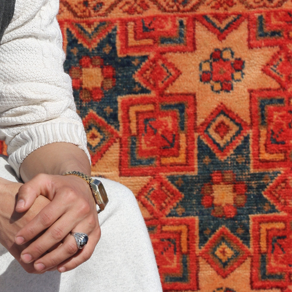Detail of vintage Taznakht carpet texture with traditional Moroccan Berber motifs