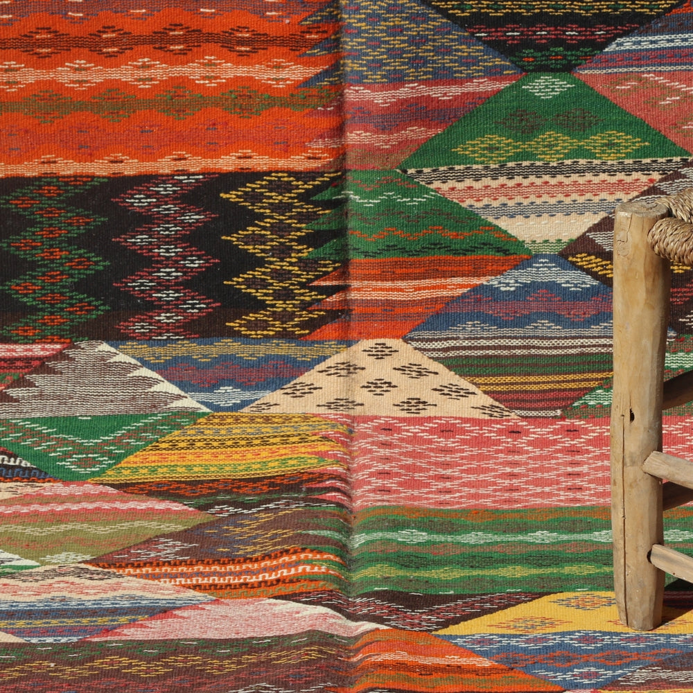 Authentic Berber Taznakht rug with vibrant colors and traditional weaving