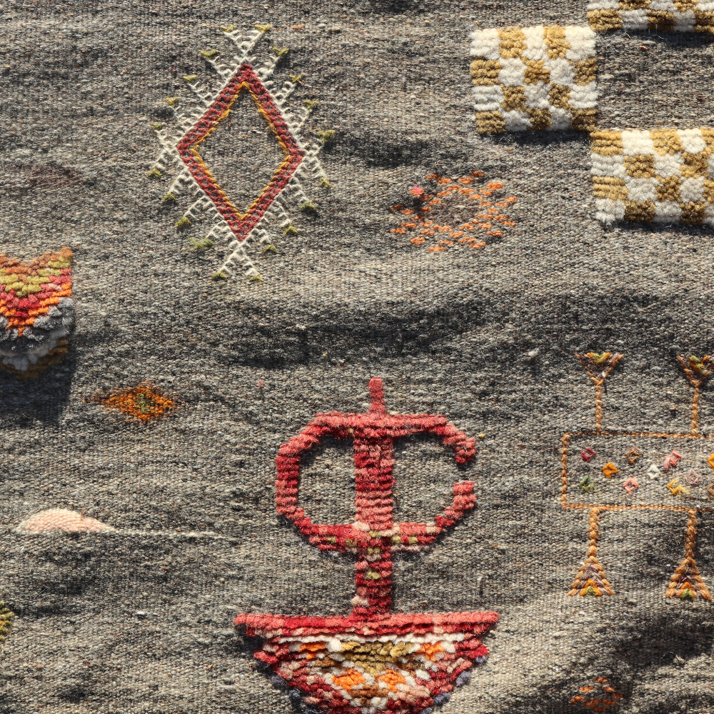 Detailed geometric motifs on handwoven Moroccan Akhnif Berber rug with tribal craftsmanship
