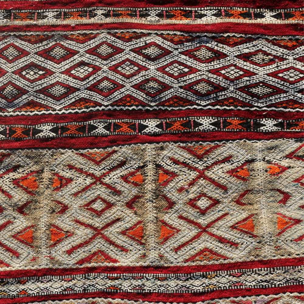 Detailed geometric motifs on Moroccan Zamour rug with handcrafted Berber wool craftsmanship