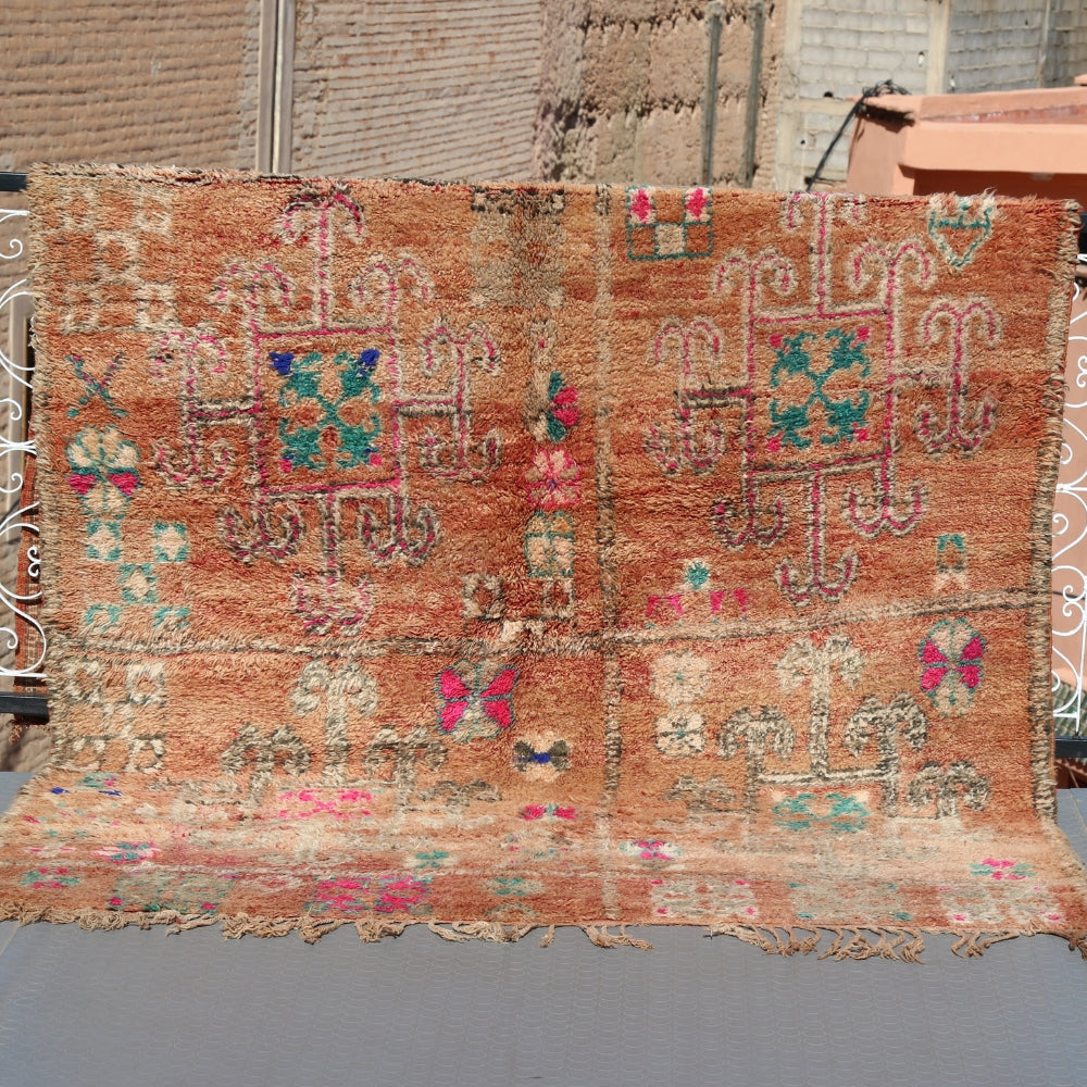 Vintage Boujaad rug handwoven in Morocco wool berber carpet with faded tribal geometric patterns