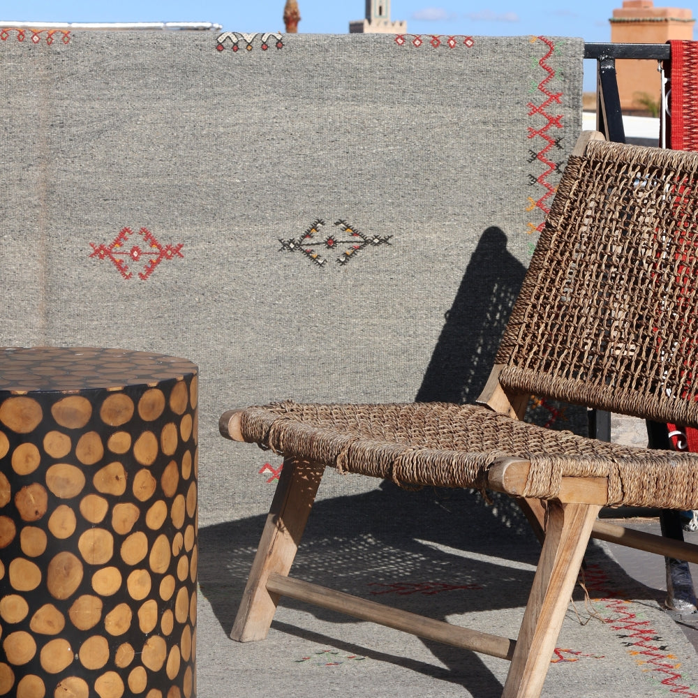 Akhnif grey flatweave rug with hand-embroidered Berber motifs