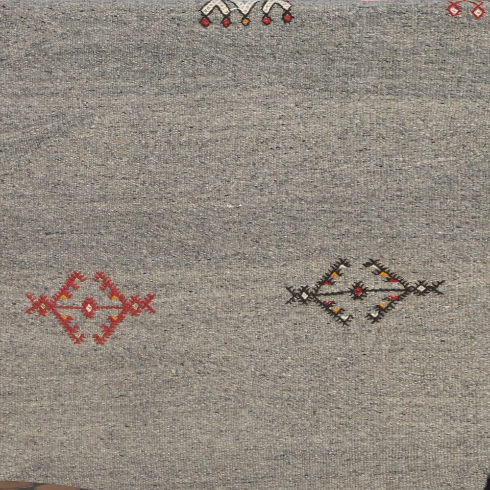 Close-up of hand embroidery on Akhnif Moroccan rug