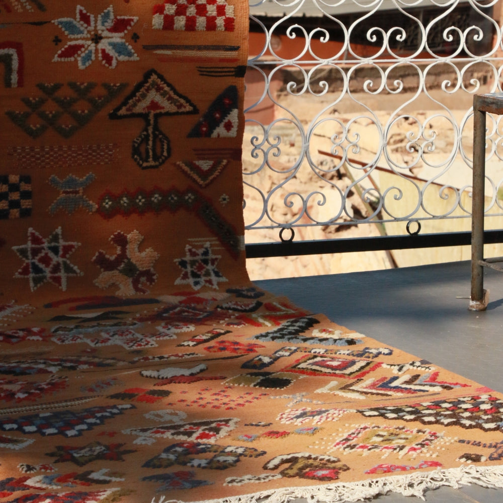 Three technique embroidered Berber rug in flatweave wool construction