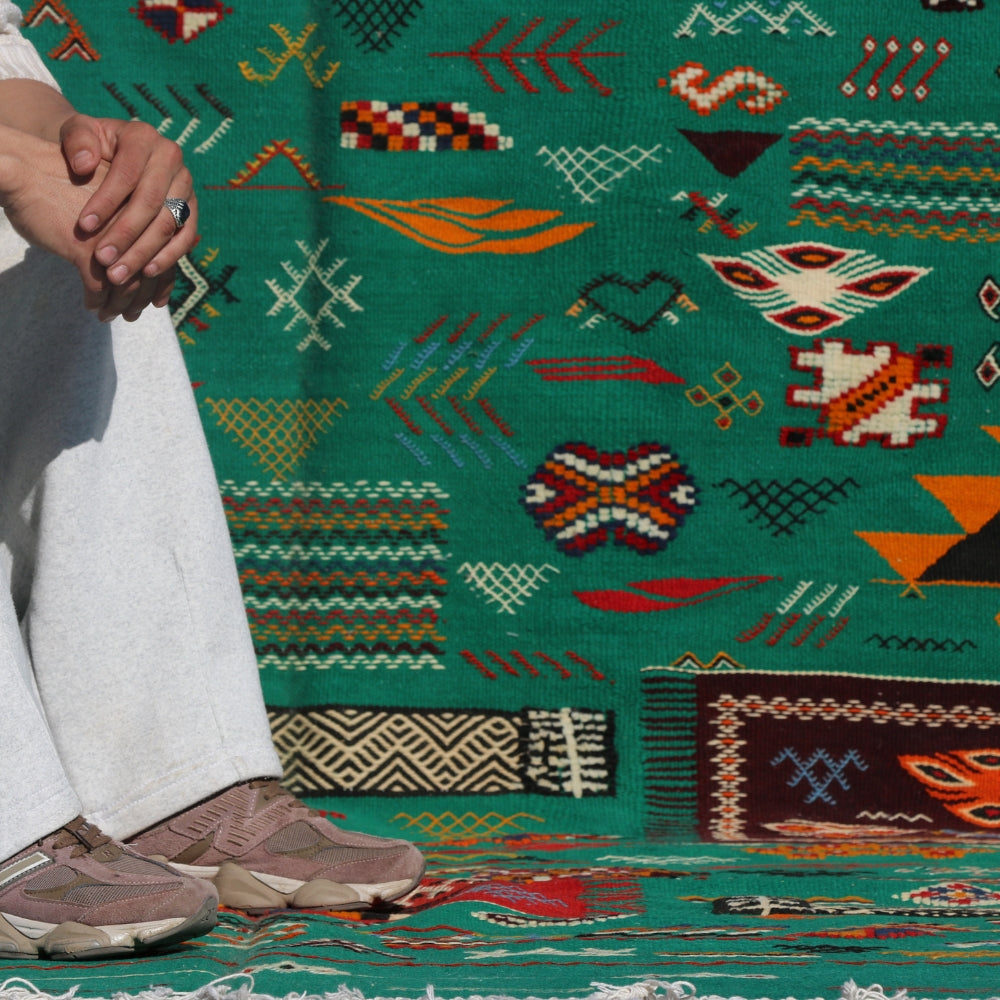 Detail of three-technique hand embroidery on Moroccan Aknif flatwoven rug