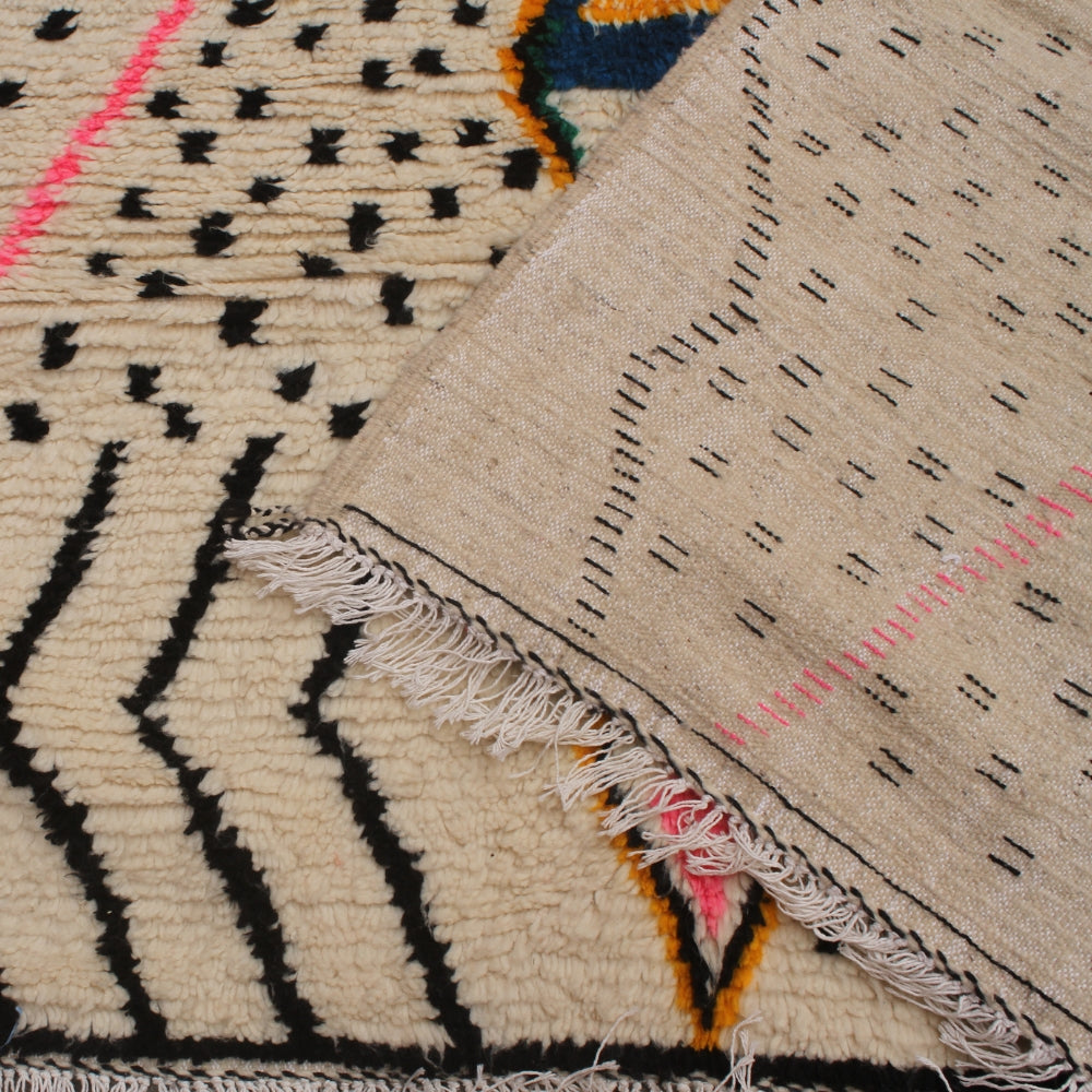 Moroccan wool rug with vibrant Berber patterns