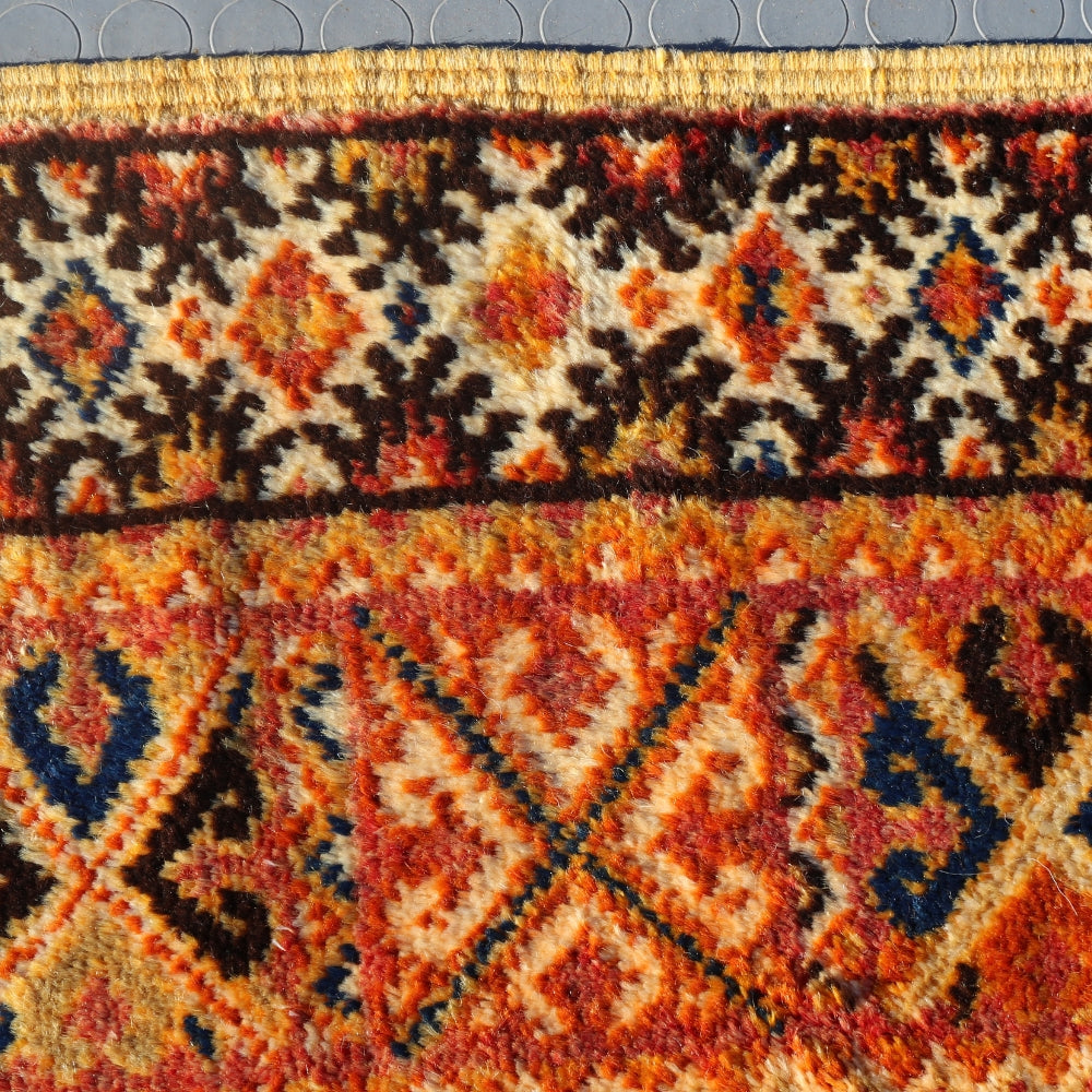 Close up of Berber rug wool texture and traditional weaving