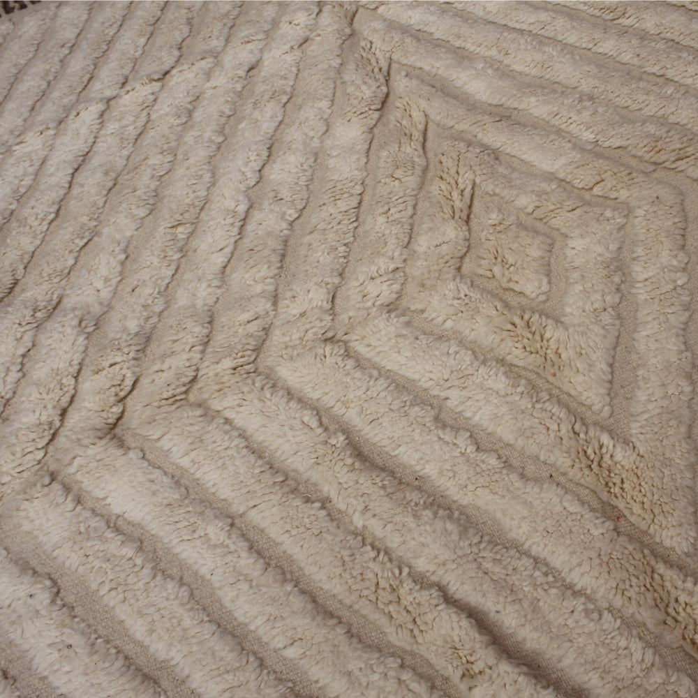 Close-up of carved berber rug with a diamond pattern