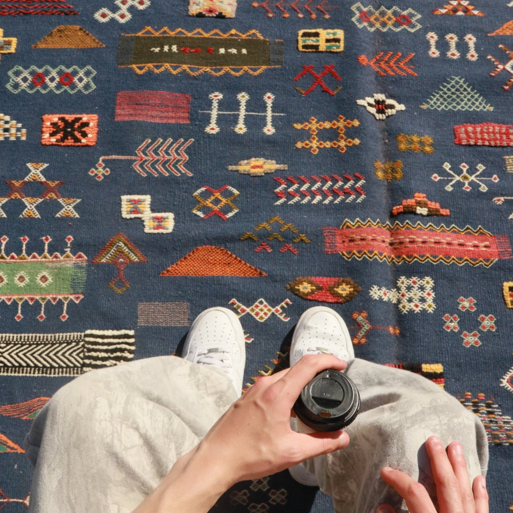 One-of-a-kind Aknif rug from Taznakht region with embroidered details