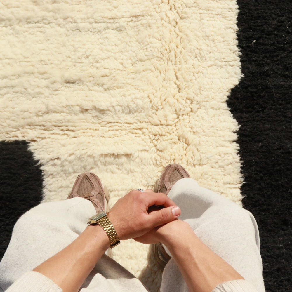 Minimalist Moroccan Beni Ourain rug in black and cream, plush hand knotted wool