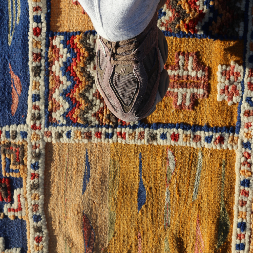 Artisan Moroccan Berber Picasso rug featuring colorful tribal patchwork and handwoven wool texture