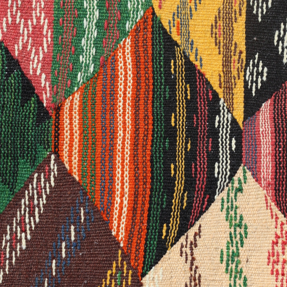 Moroccan kilim rug from Taznakht featuring multicolor wool flatweave design