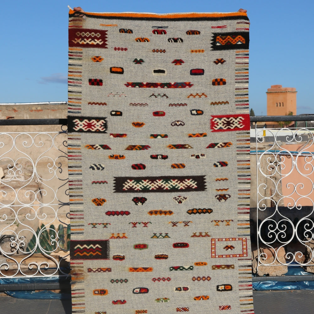 Vintage Akhnif Moroccan rug with artisanal flatwoven Berber design in neutral cream palette