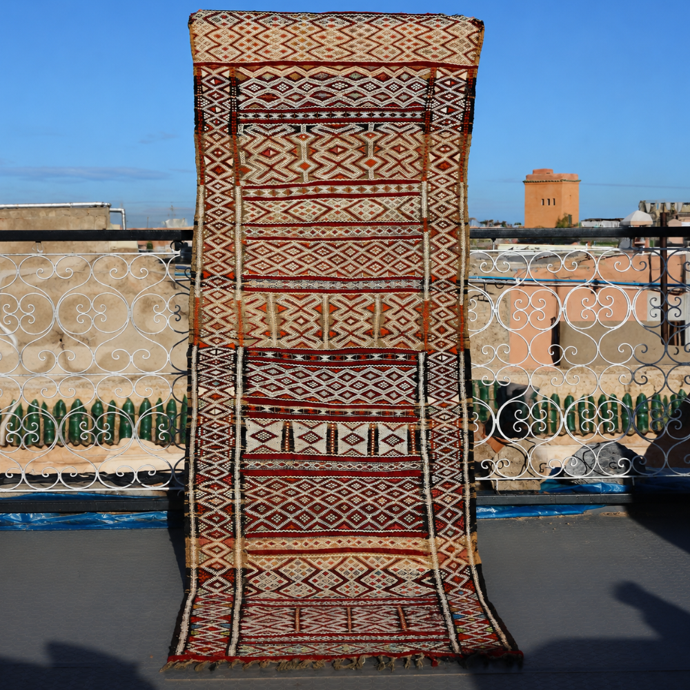 Zamour Berber rug with geometric Moroccan motifs handwoven in rich tribal wool patterns