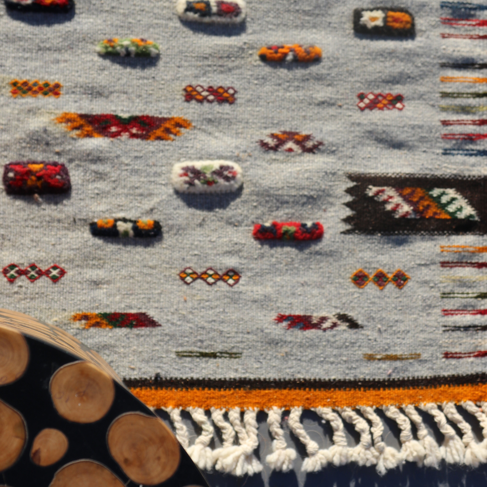 Close-up of Akhnif Berber rug showcasing handwoven Moroccan wool details and tribal motifs
